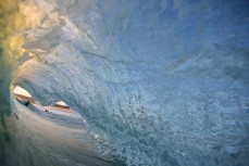 The view inside a breaking wave at St Kilda Beach, Dunedin, New Zealand. 