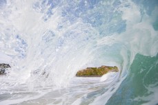 Inside an empty wave at Blackhead Beach, Dunedin, New Zealand. 
