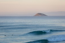 The Jenkins Family enjoy fun playful waves and crystal clear water all to themselves at Blackhead Beach, Dunedin, New Zealand. 