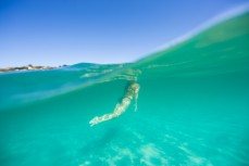 Sophie Luther swimming in summer at St Clair Beach, Dunedin, New Zealand. 