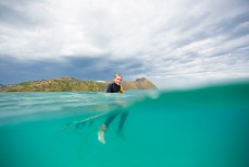 Jack Mcleod waits for a wave in fun, glassy conditions at Blackhead Beach, Dunedin, New Zealand. 