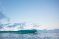 Kent Inglis rides wave of the day at a remote beach break near Raglan, Waikato, New Zealand. 