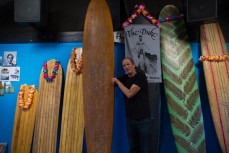 Ken Fielding with a handmade board at the inaugural Duke Longboard Festival to celebrate 100 years since Duke Kahanamoku visited St Clair Beach, Dunedin, New Zealand. 