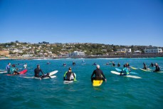 The mass paddle out at the inaugural Duke Longboard Festival to celebrate 100 years since Duke Kahanamoku visited St Clair Beach, Dunedin, New Zealand. 