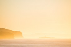 Dawn session in the water at St Clair Beach, Dunedin, New Zealand. 