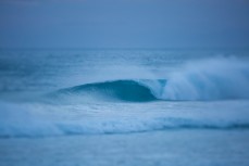 An empty wave breaks at St Kilda Beach, Dunedin, New Zealand. 