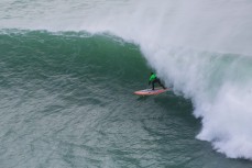 Daniel Kereopa gets a tube in big waves from Cyclone Pam at a remote point break on the North Coast of Dunedin, New Zealand, on the way to being named 2015 Ultimate Waterman . 