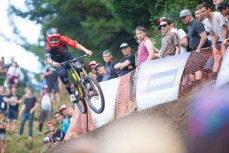 Sam Blenkinsop, of Whanganui, leaps into the final section of track during the Crankworx Rotorua Downhill presented by iXS inaugural Crankworx Rotorua event held at Skyline Rotorua, Rotorua, New Zealand, March 25-29, 2015.