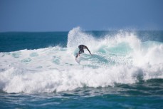 Aussie surfer Matt Crowe throws some tail on Otago Peninsula, Dunedin, New Zealand. 