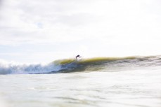 Pro surfer Billy Stairmand makes the most of a rising swell at Manu Bay, Raglan, New Zealand. 