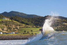 Pro surfer Billy Stairmand makes the most of a rising swell at Manu Bay, Raglan, New Zealand. 