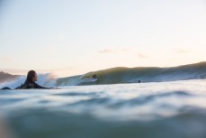 Chris Malone rides a barrel at the Ledge during a rising swell at Manu Bay, Raglan, New Zealand. 