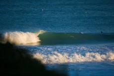 James Murphy gets barrelled in fun waves at Blackhead Beach, Dunedin, New Zealand. 