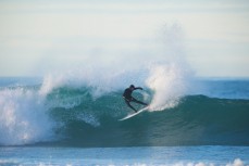 Luke Murphy unleashes in fun waves at Blackhead Beach, Dunedin, New Zealand. 