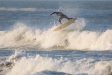 Lewellyn Thomas unwinds at dawn in fun surf at Blackhead Beach, Dunedin, New Zealand. 