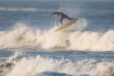 Lewellyn Thomas unwinds at dawn in fun surf at Blackhead Beach, Dunedin, New Zealand. 