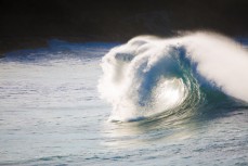 Backwash in wild surf at St Clair Beach, Dunedin, New Zealand. 