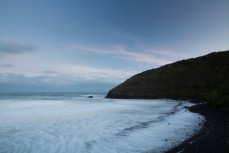 Wild surf at Second Beach, Dunedin, New Zealand. 