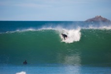 Justin Summerton drops into a solid wave at St Clair Point St Clair, Dunedin, New Zealand. 