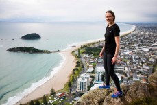 Scarlett Hagen looks out over the beaches from the summit of Mount Maunganui, Bay of Plenty, New Zealand.