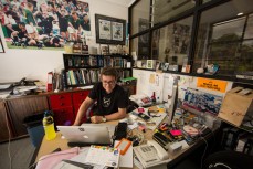 Andrew Cornaga, of Photosport, amid the chaos of a deadline, Photosport HQ, Auckland, New Zealand. 