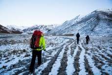 Glen Aspin heads in for ice climbing in a series of hidden valleys near Hanmer, Marlborough, New Zealand. 