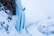 Glen Aspin descends a frozen waterfall during an ice climbing exporation in a series of hidden valleys near Hanmer, Marlborough, New Zealand. 