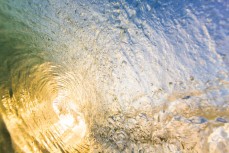 Inside a hollow wave at St Kilda Beach, Dunedin, New Zealand. 