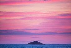 White Island at dusk at St Kilda Beach, Dunedin, New Zealand. 