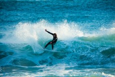 Nick Rapley rips a wave apart at St Kilda Beach, Dunedin, New Zealand. 