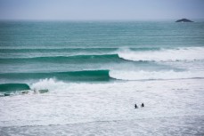 Groms James Murphy and Elliott Brown head into some fun waves at St Kilda Beach, Dunedin, New Zealand. 