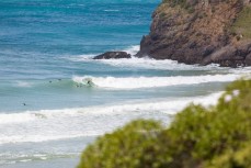 A surfer cuts back on a wave on Otago Peninsula, Dunedin, New Zealand. 
