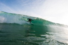Elliott Brown rides in a barrel at St Kilda Beach, Dunedin, New Zealand. 