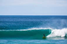 Surfers welcome a new swell at St Clair Beach, Dunedin, New Zealand. 