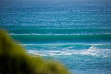 A wave breaks at Blackhead Beach, Dunedin, New Zealand. 