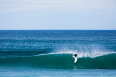 Surfers welcome a new swell at St Clair Beach, Dunedin, New Zealand. 