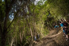 Leighton Kirk races past the crowd on Signal Hill on his way to second overall at the 2015 Urge 3 Peaks Enduro mountain biking race held in Dunedin, New Zealand. November 29, 2015.