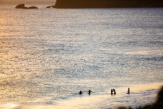 Swimmers make the most of a summer afternoon at St Kilda Beach, Dunedin, New Zealand. 