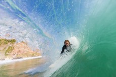 Zen Wallis gets barreled in a clean cyclone swell at Aramoana, Dunedin, New Zealand. 