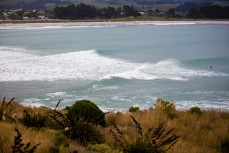 A small swell reels down the banks at Karitane on the North Coast, Dunedin, New Zealand. 