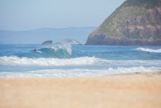 Lazy summer swell at St Kilda Beach, Dunedin, New Zealand. 