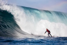 Andy Eman rides a beautiful wave at a remote reefbreak near Dunedin, Otago, New Zealand. 