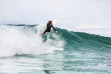 Luke Murphy makes the most of fun waves at Blackhead Beach, Dunedin, New Zealand. 