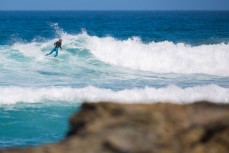 James Murphy enjoys the summer heat and fun waves at Brighton, Dunedin, New Zealand. 
