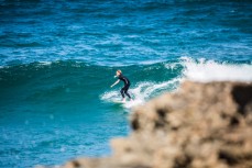 Ruben Peyroux enjoys the summer heat and fun waves at Brighton, Dunedin, New Zealand. 