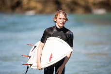 Ruben Peyroux enjoys the summer heat and fun waves at Brighton, Dunedin, New Zealand. 