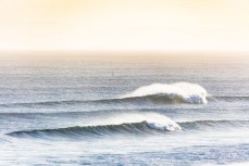 Summer afternoon peelers at St Kilda Beach, Dunedin, New Zealand. 