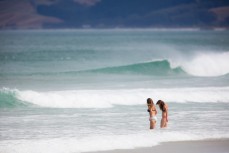 A couple of beachgoers hit the water in undies at Blackhead Beach, Dunedin, New Zealand. 