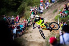 British rider Brendan Fairclough throws his bike sideways after snapping his chain in the gate during the Crankworx World Tour downhill event held at Skyline Rotorua, Rotorua, New Zealand, March 9-13, 2016.