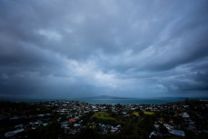 Rangitoto swamped by an autumn rain storm, Devonport, Auckland, New Zealand. 